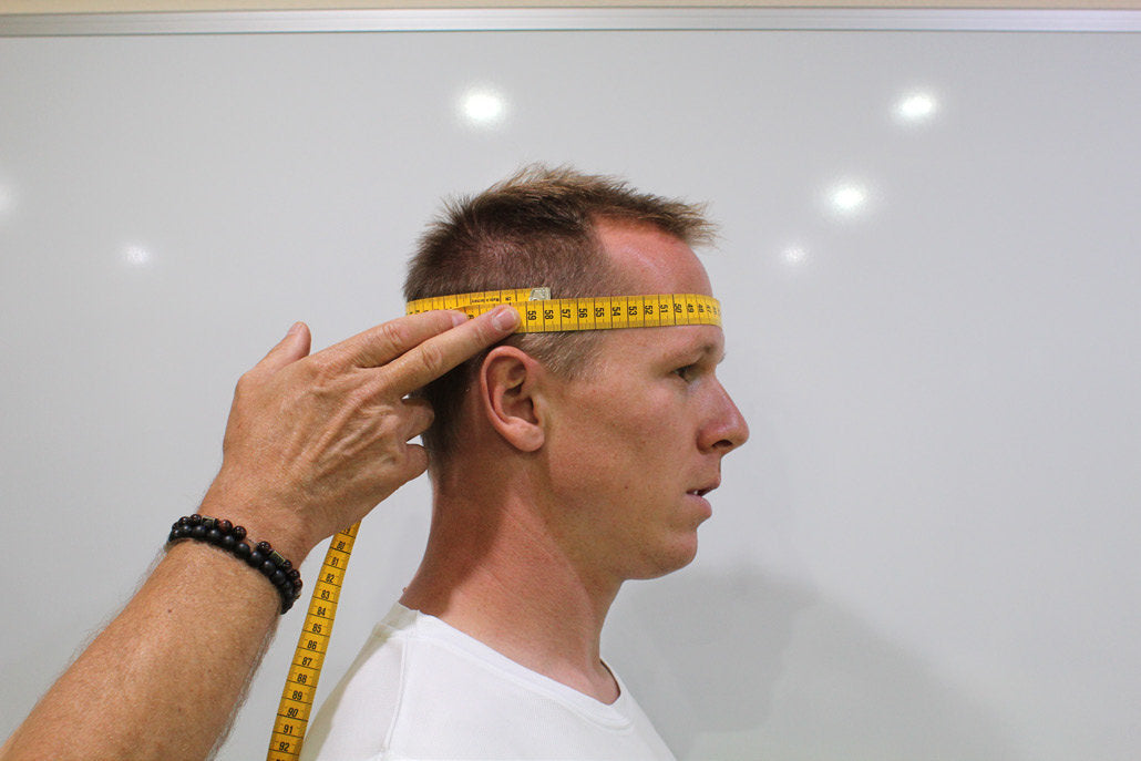 Place the tape at forehead height